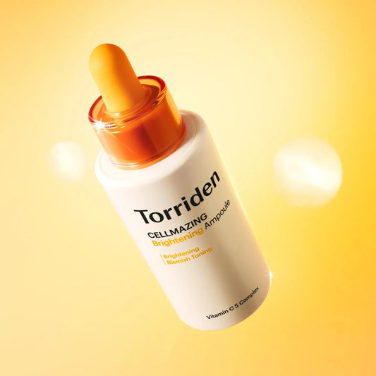 Torriden Cellmazing Brightening Ampoule bottle with dropper on a yellow background