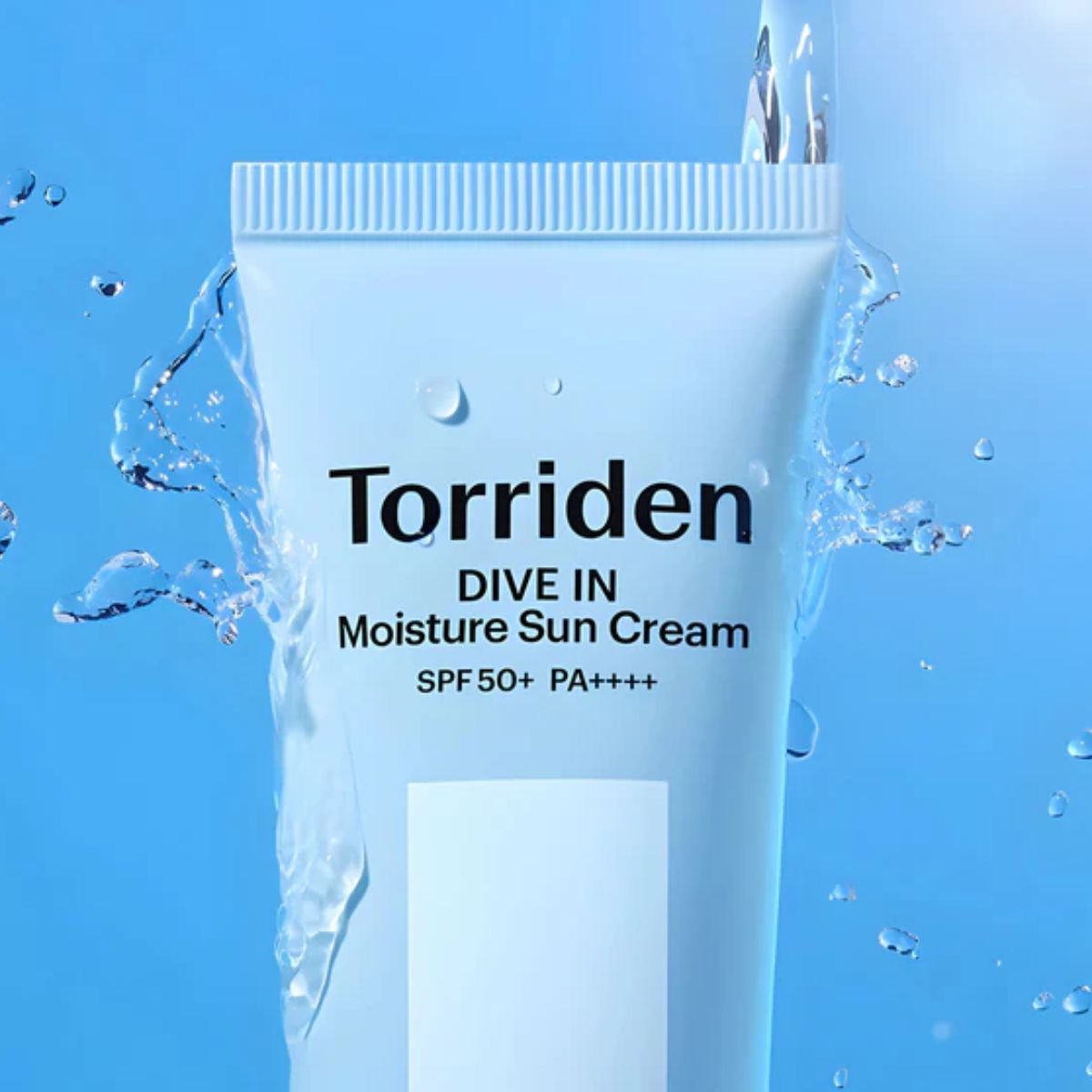 GlowMethodShop Torriden moisture sun cream tube on a blue background with water droplets