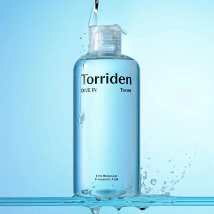 Torriden toner bottle with water droplets on a blue background