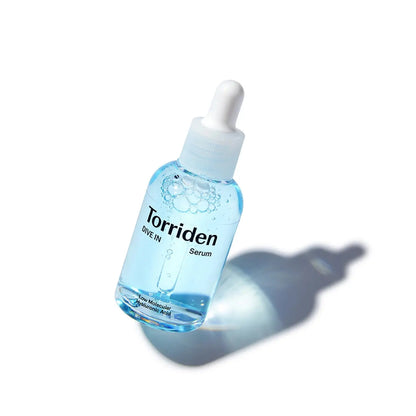 Torriden serum bottle on a white background